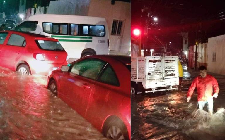 Tromba azota a Izúcar: auto es arrastrado y dos combis caen en coladeras